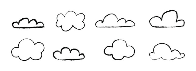 Black crayon cloud shapes set. Hand drawn doodle collection. Rough scribbled clouds bundle