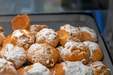 Custard cakes sprinkled with powdered sugar