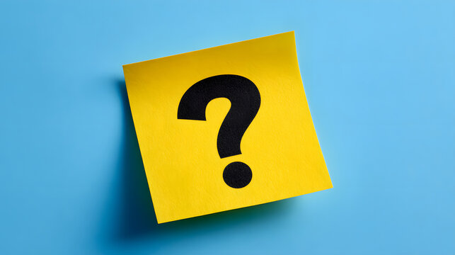Yellow sticky note with question mark on blue background