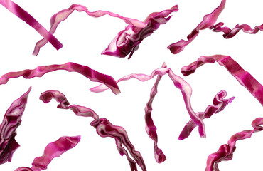 Shredded fresh red cabbage falling on white background