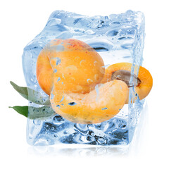Ripe apricot fruits in ice cube isolated on white. Frozen food