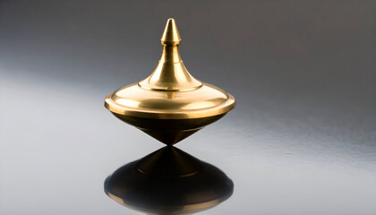Golden Spinning Top on Dark Surface.