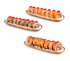Colorful sushi rolls served on elegant platters at a dining table