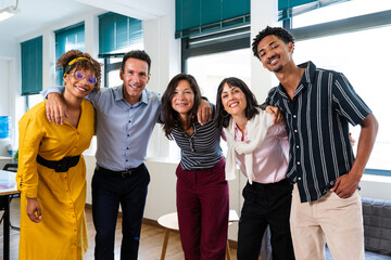Startup business team embracing diversity and collaboration in modern office