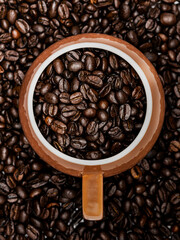 Close-up of the texture of coffee beans in a cup