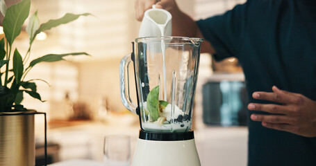 Blender, kitchen and hands in home for nutrition, breakfast and snack or diet. Smoothie, weight loss and male person with organic ingredients for health, wellness or morning fruit drink in house