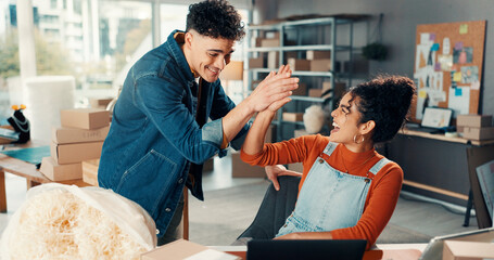 Happy people, high five and winning with laptop for small business success, good news or logistics....