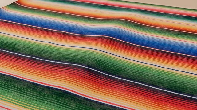 Colorful mexican blanket gently waving in slow motion
