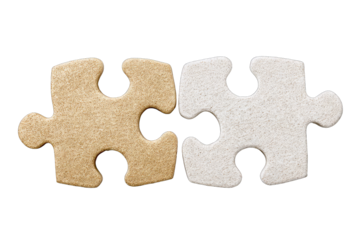 Two puzzle pieces, light beige and white, joined