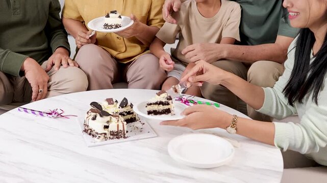Three-Generation Family Celebrates with Birthday Cake