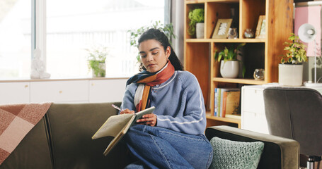 Writing, creative and woman with notebook, lounge or writer with idea for fiction novel or...