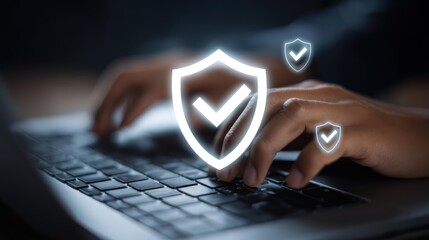 Hands typing on laptop with glowing holographic security shield icons (with check marks) floating above keyboard, representing digital security concepts for cyber themes.