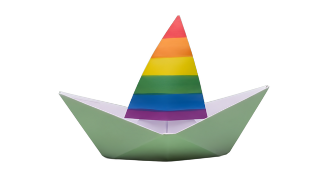 A handmade origami paper boat with a rainbow sail, symbolizing pride and diversity.