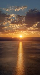 Obraz premium Vibrant sunset over calm ocean, sun rays reflecting on water