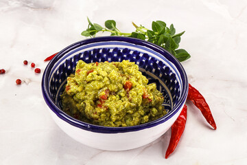 Guacamole with avocado, tomato and chili