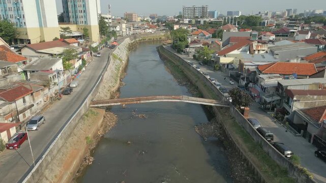 Pedestrian Bridge Over Polluted Canal Tebet Jakarta Indonesia Drone Track In 4K 60FPS