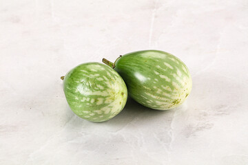 Ripe green mini eggplants heap