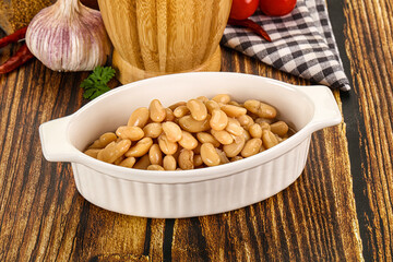 Baked white canned beans in the bowl