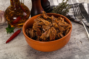 Shredded slow cooked pork meat