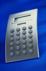 calculator on blue background
