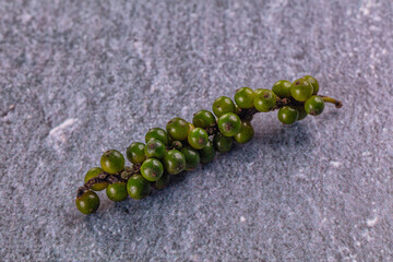 Ripe green pepper corn branch