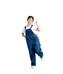 A young girl in blue overalls giving an okay hand gesture, smiling with confidence on PNG 