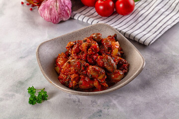 Roasted chicken hearts with vegetables