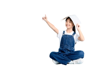 A young girl with a book on her head pointing upwards, showing the power of imagination on PNG 