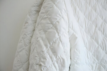 Fototapeta premium Close-up of White Quilted Fabric Texture Detail