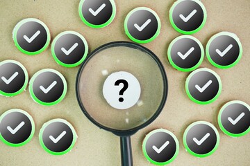 Magnifying glass with right or true and question mark symbol. symbolizing investigation,...