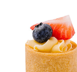 Delicious dessert with fresh fruits served in a pastry shell at a cafe