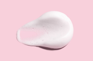 texture foam mousse foam cosmetic smear sample on pink background