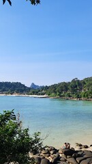 tropical beach with blue water