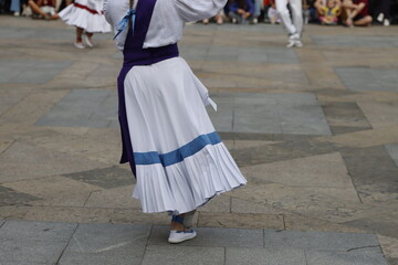 Basque folk dance performance in an outdoor festival