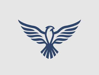 Flying eagle logo design. Vector illustration. Stylized bird logotype.
