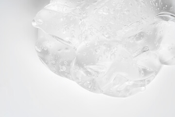 Liquid gel abstract cosmetic in white background. Smear of transparent moisturizing product