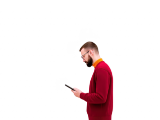 Young man in red sweater and glasses standing sideways, holding smartphone and looking at screen, isolated on transparent background, casual style, focused expression