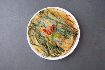 Gray background Seafood pancake, a traditional Korean dish 회색배경 한국의 전통 음식인 해물 부침개