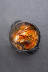 Seafood soup with blue crabs on a gray background 회색 배경에 꽃게가 들어간 해물탕