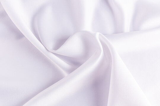 Satin fabric texture with elegant white tones