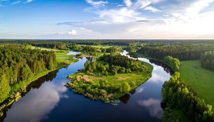 Obraz premium Serene river winding through lush green landscape