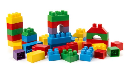 Naklejka premium Vibrant and Colorful Plastic Building Blocks Arranged and Scattered, Forming Playful Structures on a Clean White Background for Children's Creative Play