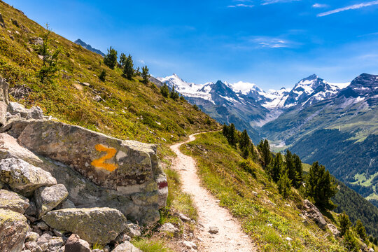 Alpine hiking trail from St-Luc to Zinal in Valais Switzerland summer landscape