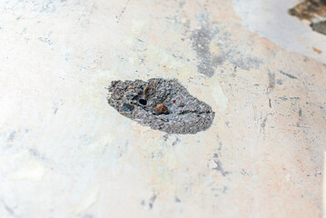 An old concrete wall was torn down before interior finishing work was carried out on the house....