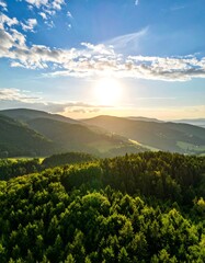 Fototapeta premium Panoramic vista of rolling hills at sunset