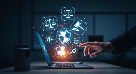 Fototapeta premium Businessmans Hand Accessing Futuristic Legal Tech Hologram with Justice and Security Icons.
