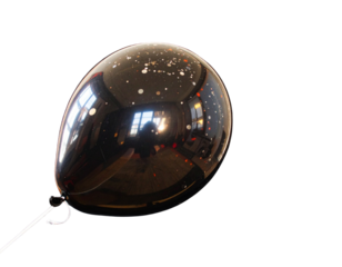 Tilted Blue Balloon with Shiny Surface Reflection, Isolated on Black Background PNG