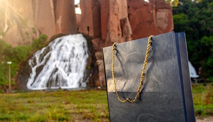 Shopping bag in front of a waterfall
