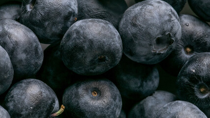 Plump blueberries glisten with morning dew, evoking forest whispers, Nordic midsummer enchantments, mystical nature's bounty revealed anew