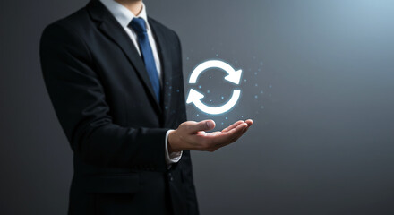 Businessman Holding Circular Refresh Icon Concept for Update, Sync, and Continuous Process